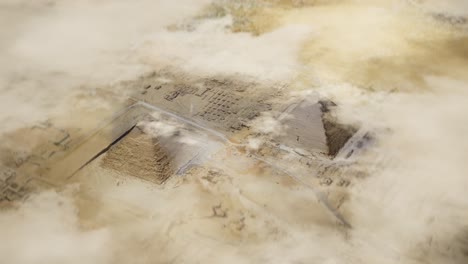 aerial shot of egyptian pyramids in giza under moving clouds. giza pyramids under clouds