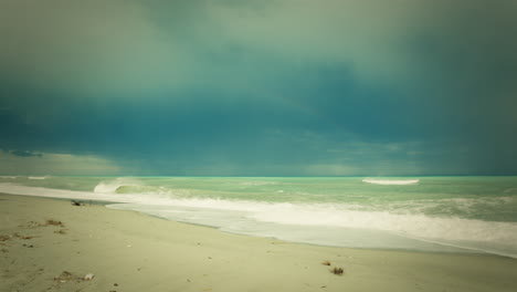 stormy ocean with ominous, leaden rain clouds on the horizon