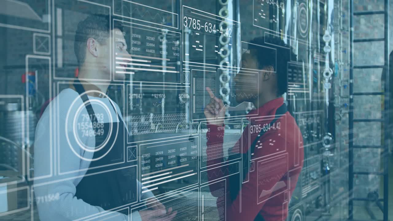 Operator explaining manufacturing metrics while coworker tapping floating chart for quality control