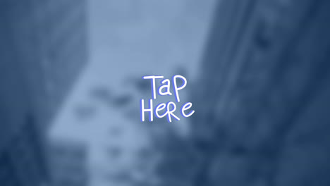 Animation-of-tap-here-text-over-blurred-background