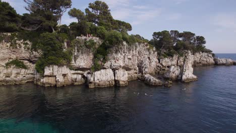 gorgeous mediterranean sea cliffs on antibes coast, south of france - aerial