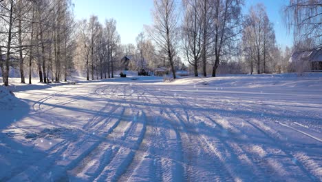 Brave-people-drove-over-frozen-lake-on-extremely-cold-winter,-sunny-day-snowfall