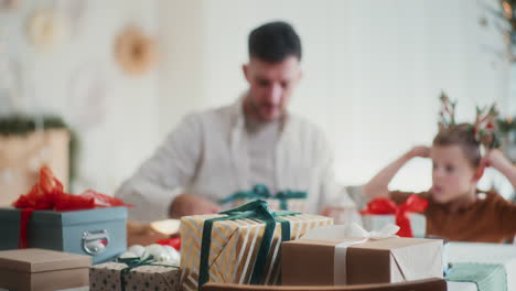 close up of christmas presents in the background