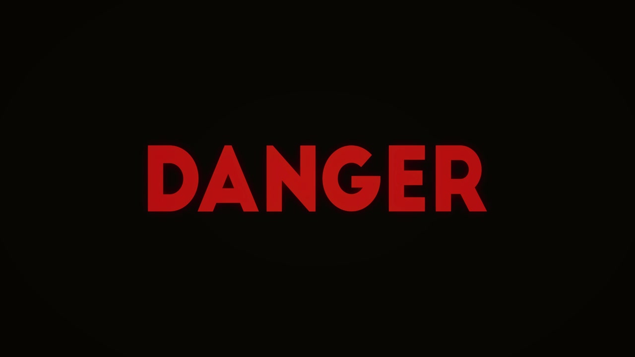 Bold red DANGER text flashing on black background, creating an urgent warning message