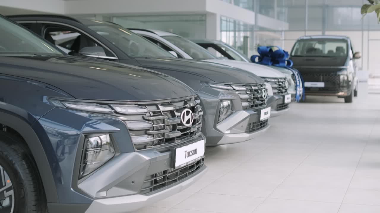 New Hyundai Tucson SUVs in Dealership Showroom