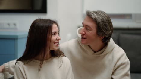 Two-people-young-couple-adult-man-and-woman-husband-and-wife-talking-and-chat-happy-smile