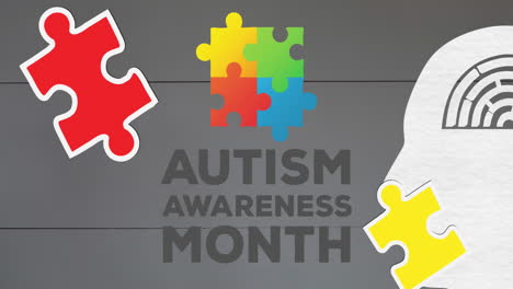 animation of autism awareness month text over white head with maze and puzzles falling