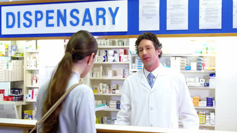 pharmacist assisting the medicine to customer