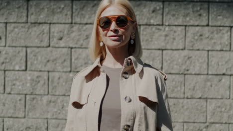 stylish woman in a beige trench coat
