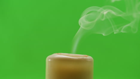 candle with smoke on green screen
