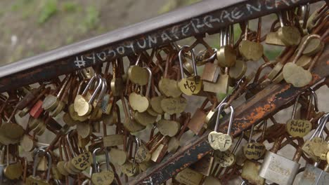 railing or iron fence covered with love padlocks