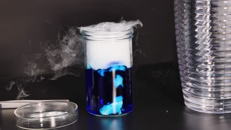 dry ice reacts with water, creating smoke