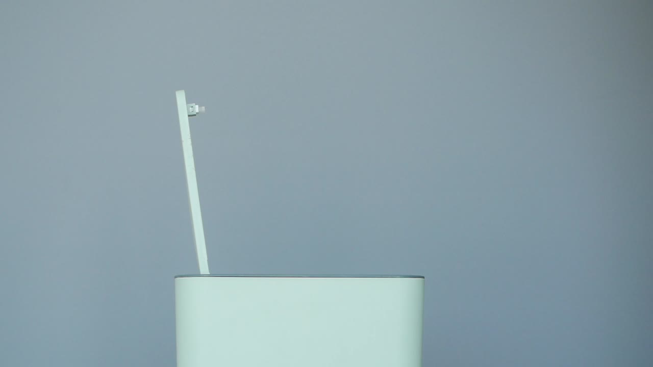 Throwing away rotten orange