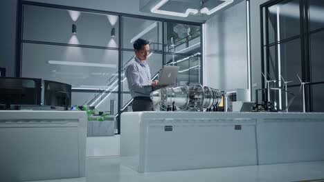 engineer working on a jet engine in a modern laboratory