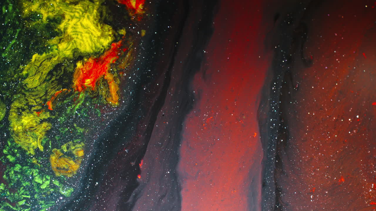 Vivid macro shot of colorful substances mixing dynamically
