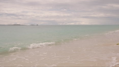 small waves at tropical beach indonesian island