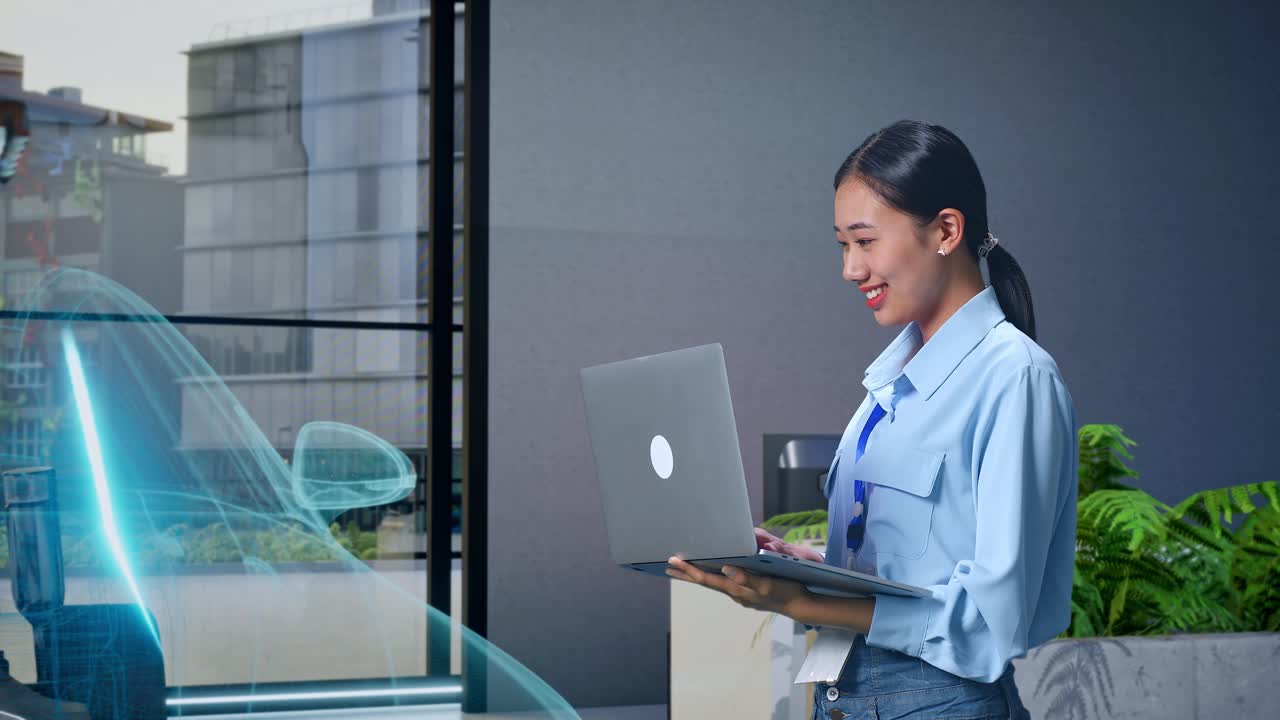 현대적 인 사무실 에서 노트북 을 사용 하는 여자