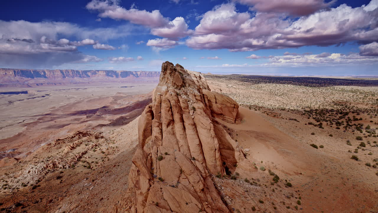 Stunning drone footage tracing the sharp cliffs of the mountain range, revealing the vast drop-off near Antelope Pass Vista along Highway 89.