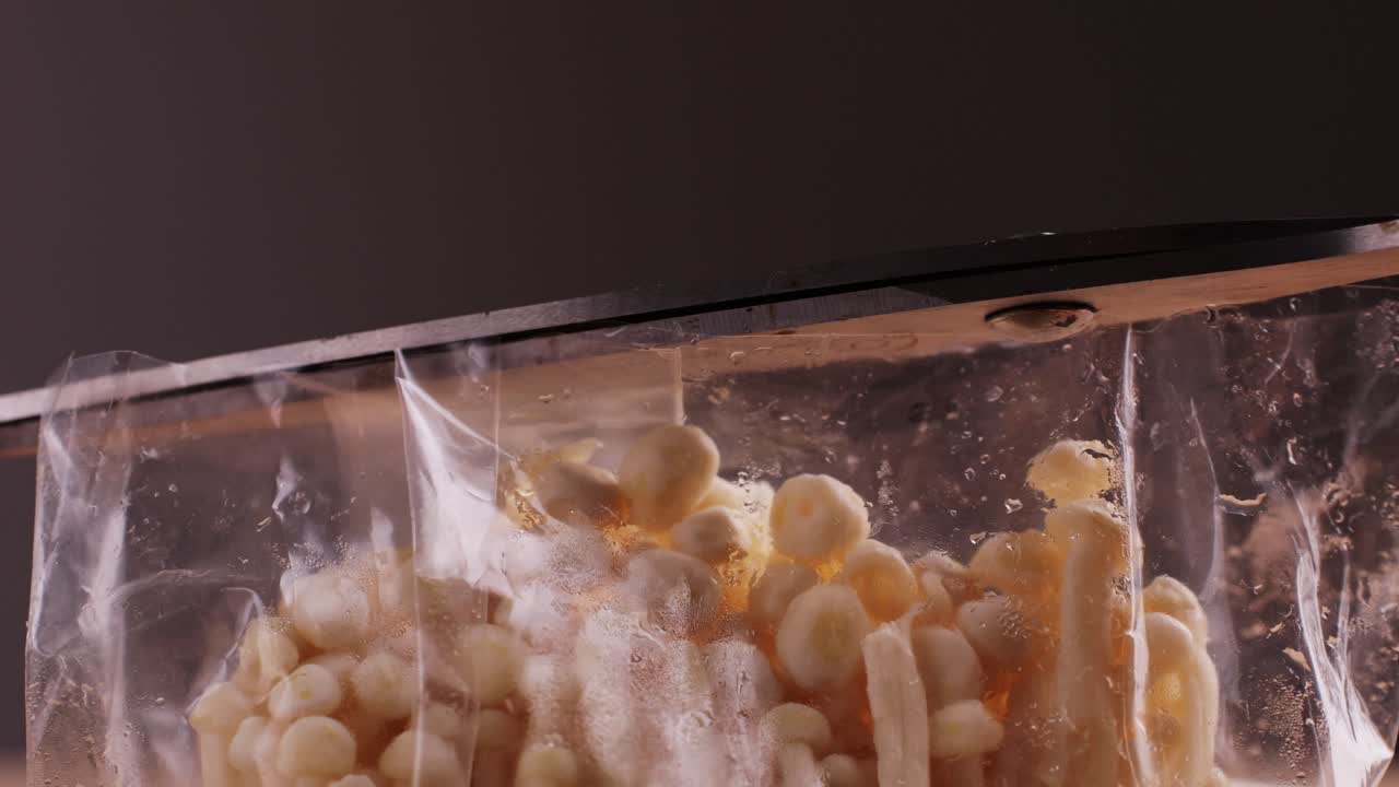 Opening a Bag of Frozen Enoki Mushrooms