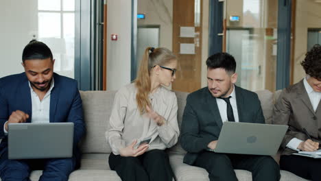 business people waiting in office