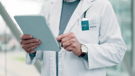Doctor,-tablet-and-hands-in-hospital-for-research