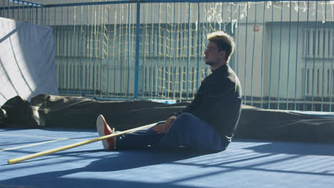 man resting after training session