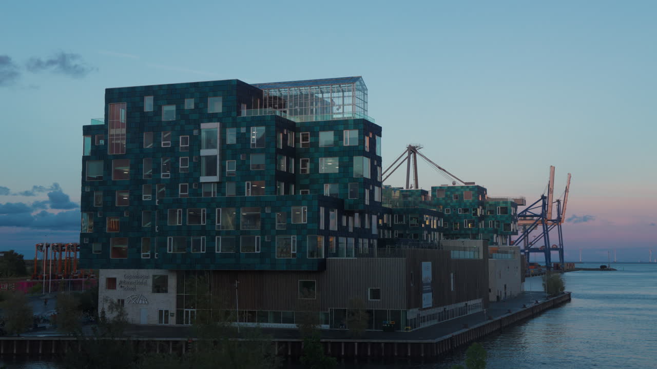 Modern School Building by the Port at Sunset