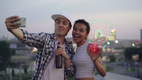 Happy Couple Taking Selfie at Night