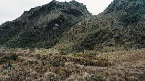 hikers walking in the trail with scenic landscape of cayambe coca ecological reserve in napo, ecuador