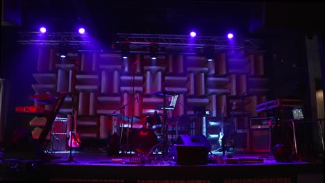 music instruments and lights on a stage, all is ready for a live performance