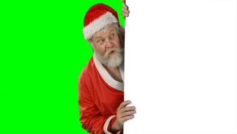 Papá-Noel-Sorprendido-Escondido-Detrás-De-Una-Pantalla-Verde