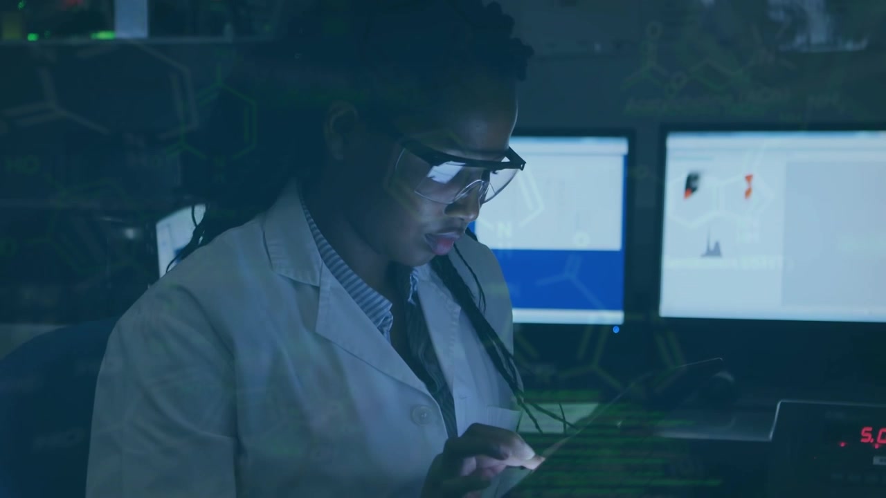 Animation of scientific data over afrcian american female lab worker using tablet
