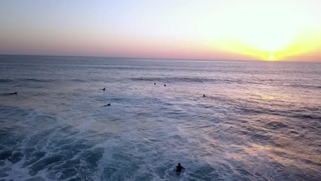 Slow-motion-of-a-surfer-paddling-on-his-board