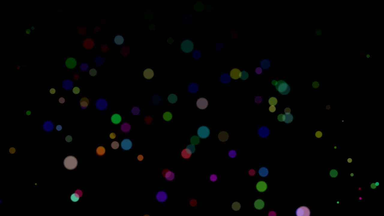 abstracto volando partículas coloridas aisladas en fondo negro. bokeh dinámico brillante en cámara lenta. animación de bucle digital 3d.