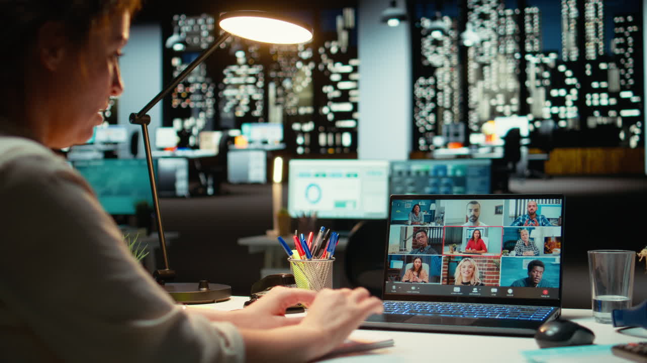 Vertical Video Entrepreneur using laptop and microphone for a collaborative talk on video call