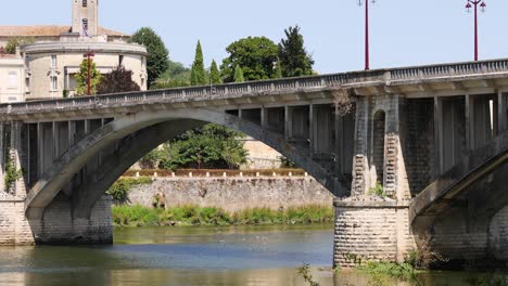 bridge with vehicles and birds in summer