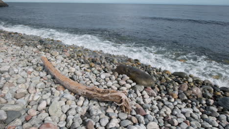 ocean waves crashing into a rocky beach - slow motion