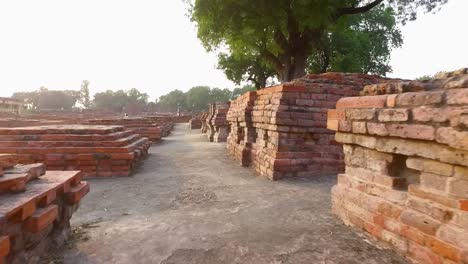 The-Ancient-Ruins-of-the-Archaeological-Site-in-Sanarth,-Varanasi,-India-with-Close-Up-of-Brick-Pedestals