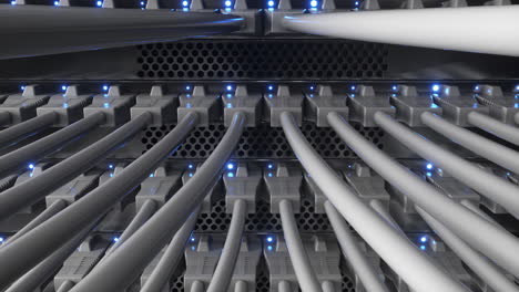 close up view of internet network switch with connected white ethernet cables