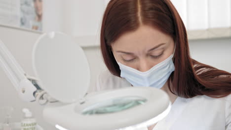 medical examination with magnifying glass