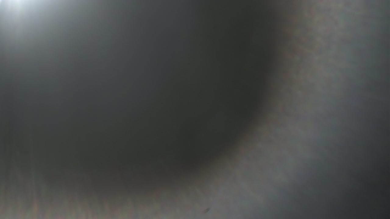 Colorful light halo affect of glowing lamp in dark space