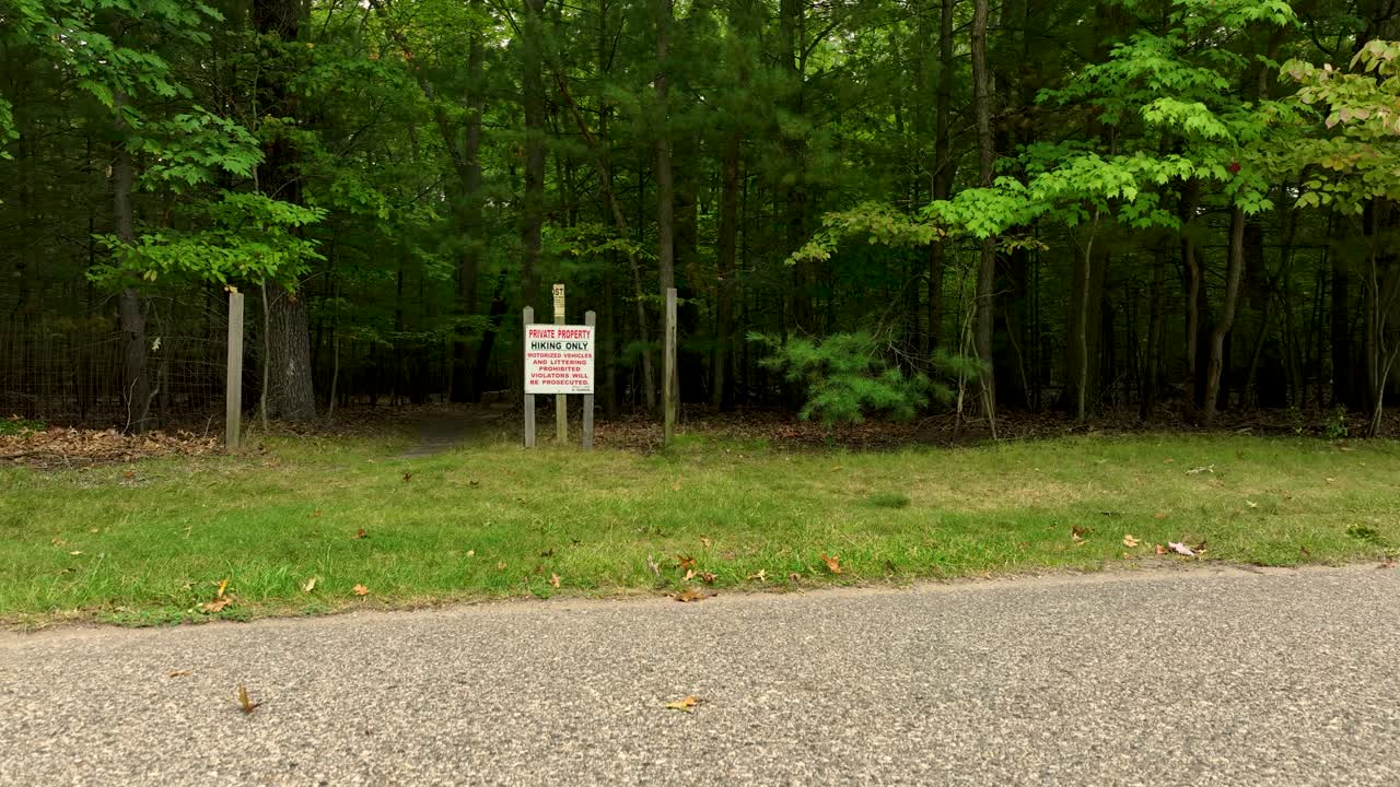 A 'Hiking Only' Sign near a trailhead
