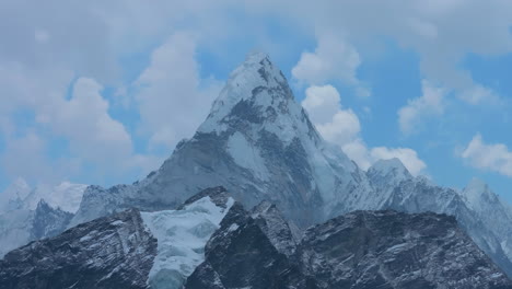 ama dablam mountain seen from kala patthar, everest base camp nepal. majestic peak under shifting skies, cloudy weather, and high-altitude himalayan scenery reveal climate change conservation, peace