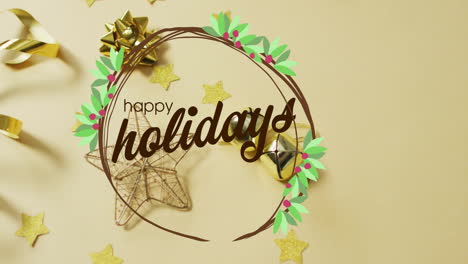 animation of happy holidays text over christmas decorations on yellow background