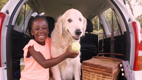 Cute-girl-is-petting-with-a-dog-