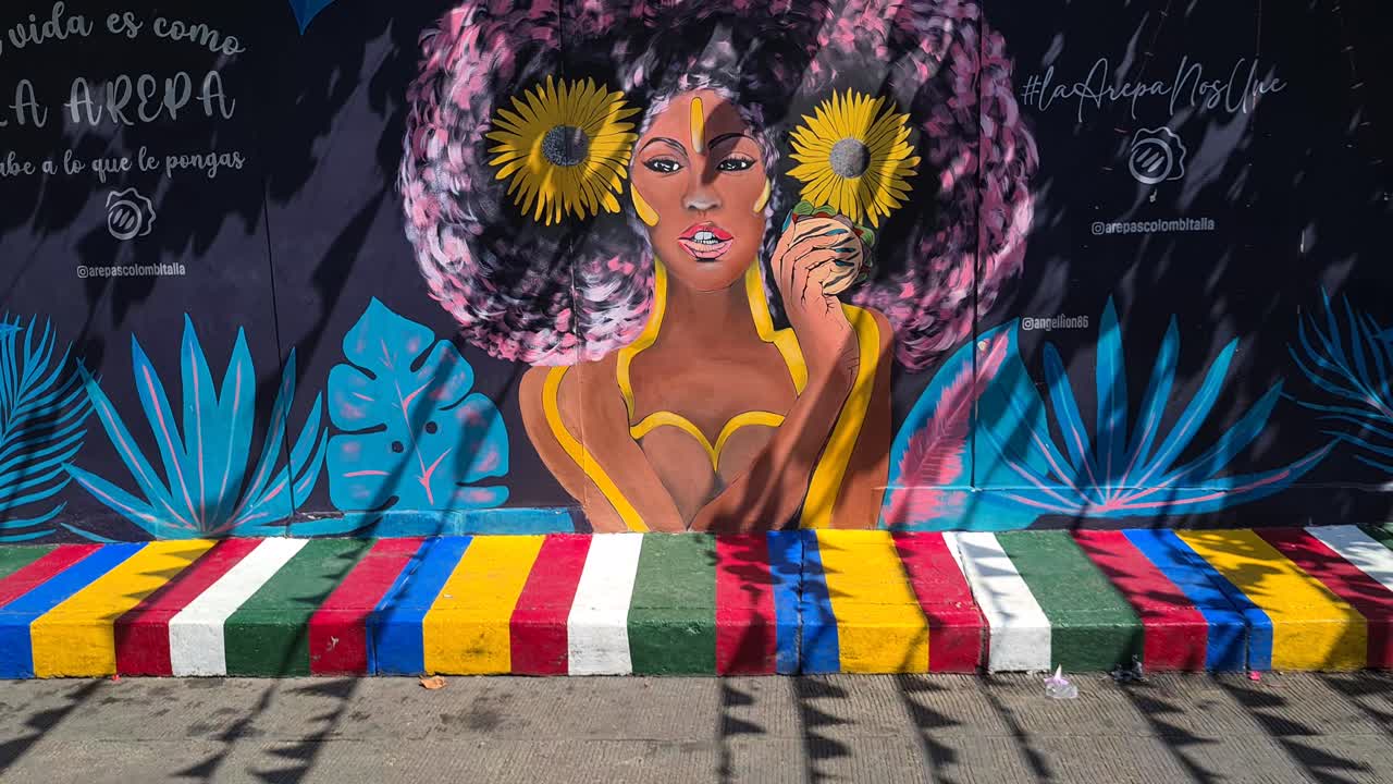 Colorful Painting on Street Wall and Sidewalk in Old Town Cartagena, Colombia