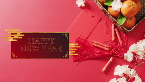 animation of new year greetings text over chinese traditional decorations on red background