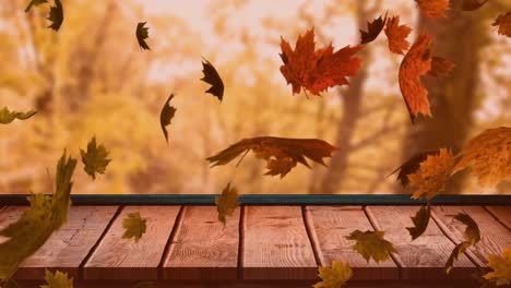 Animation-of-autumn-leaves-floating-over-wooden-plank-against-trees-in-the-park-with-copy-space