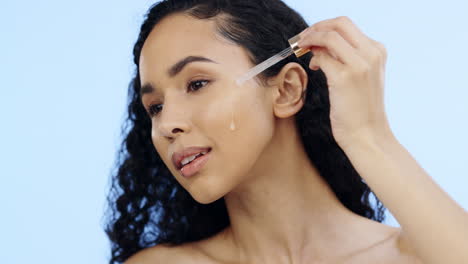 mujer, belleza y gotero de aceite para maquillaje facial