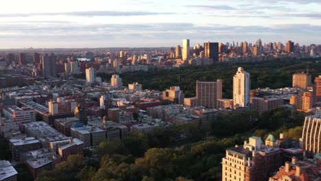 aerial footage pans from the upper west side across to harlem neighborhoods of nyc